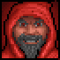 In-game graphic of the face of a man with a beard in red robes