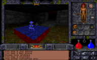A fountain in the courtyard of Castle Britannia in Ultima Underworld II