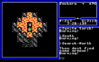 Ultima V screenshot of the player surrounded by mountains and lava with a suit of armour nearby.