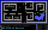Screenshot of Ultima I, featuring tile graphics of a player venturing into the city of Britain. Several shops and populace are visible as well as a pond.