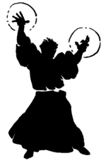 silhouette of a mage with auras around his hands.