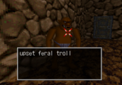 Ultima Underworld (PSX) screenshot: a dark brown feral troll